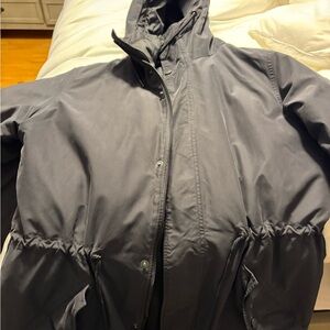 Women’s black Burton coat.